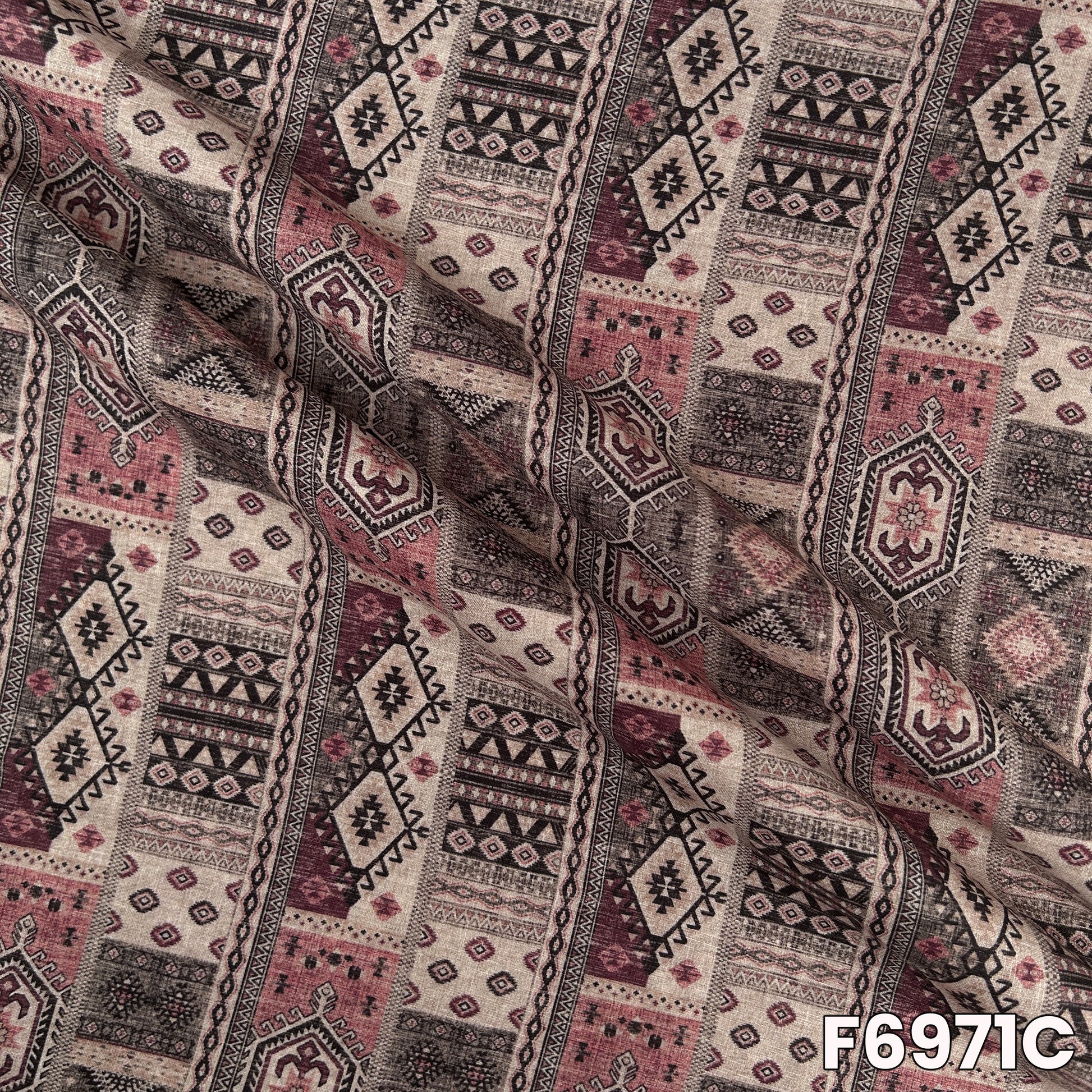 Close-up of F6971C displaying layered geometric blocks, muted tones and refined linen-style finish