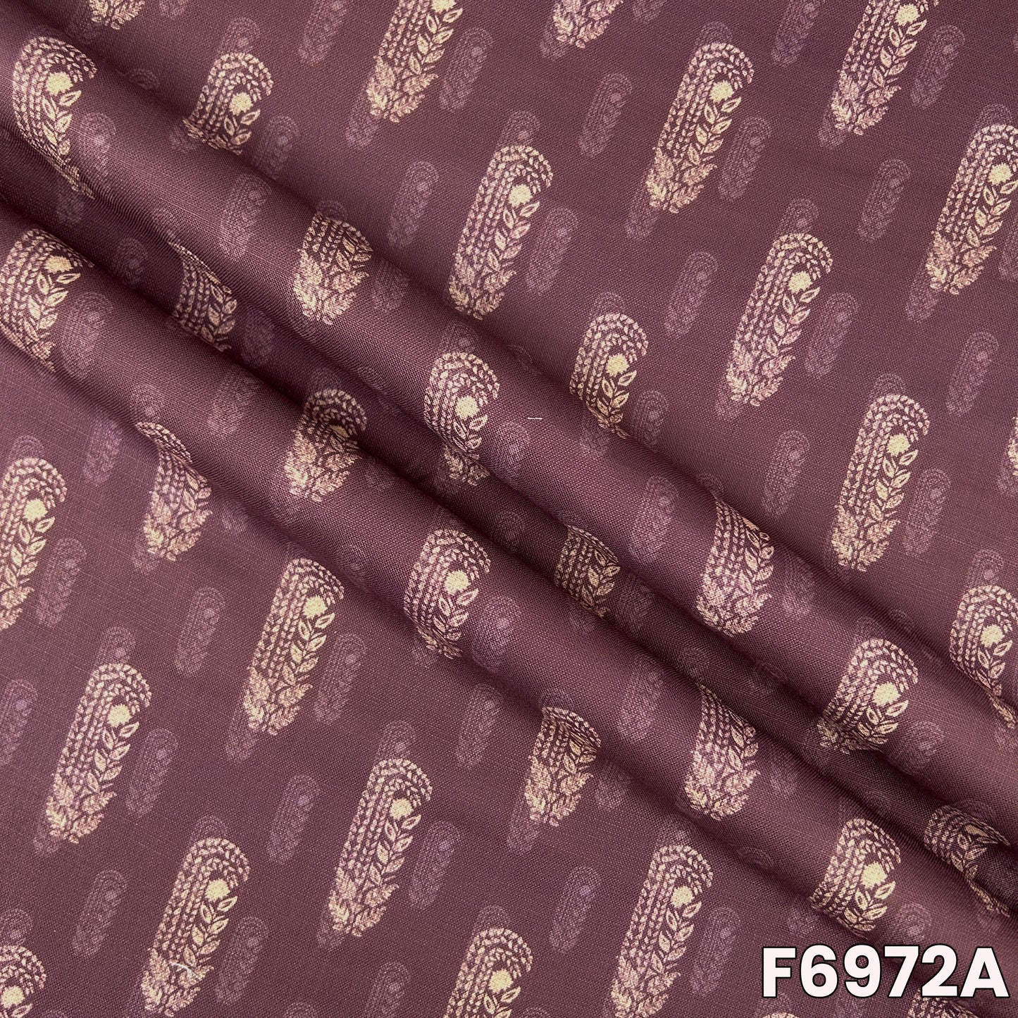 Close view of F6972A showing neat paisley placement, soft folds and natural linen texture