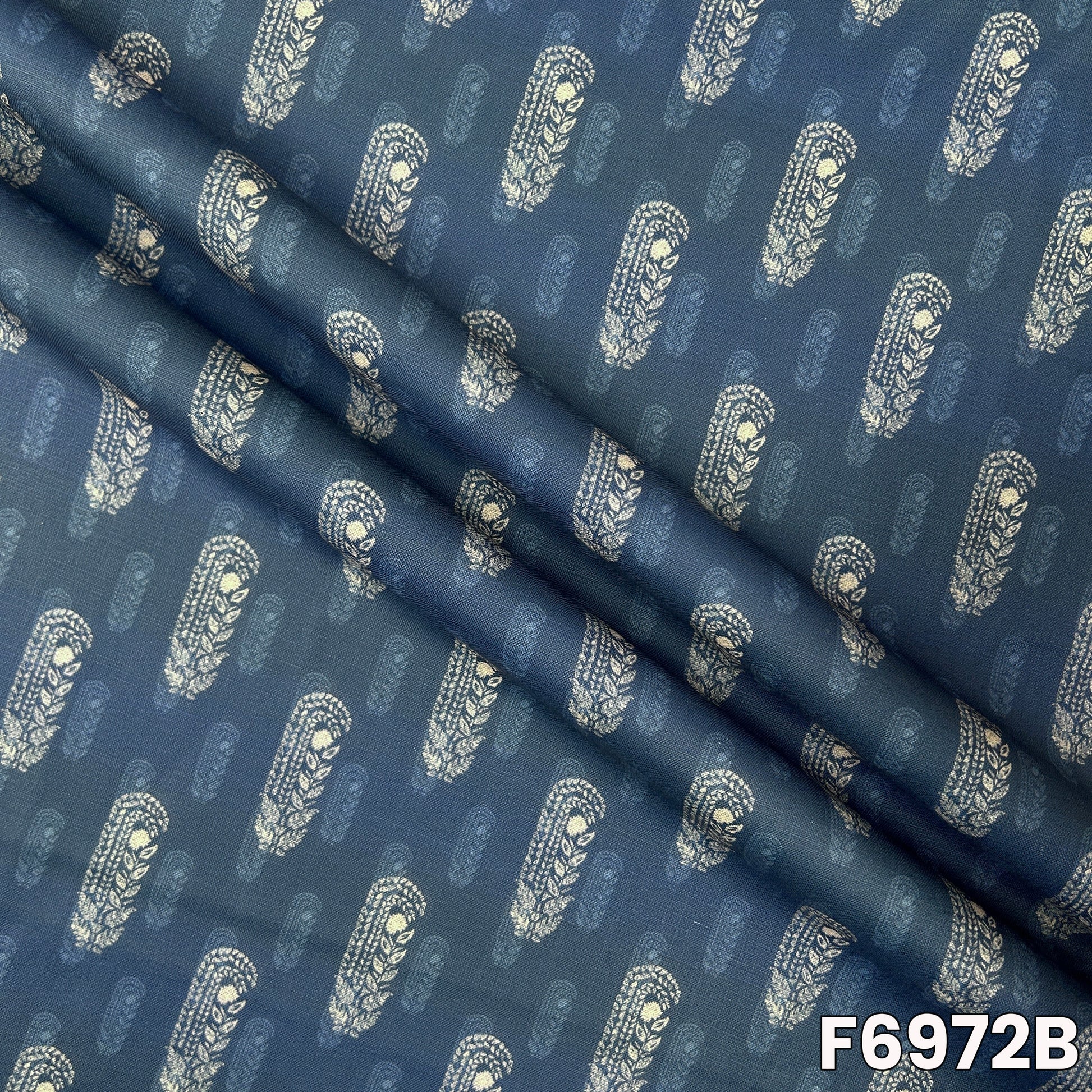 Detailed F6972B view highlighting fine buta artwork, breathable woven feel and graceful drape