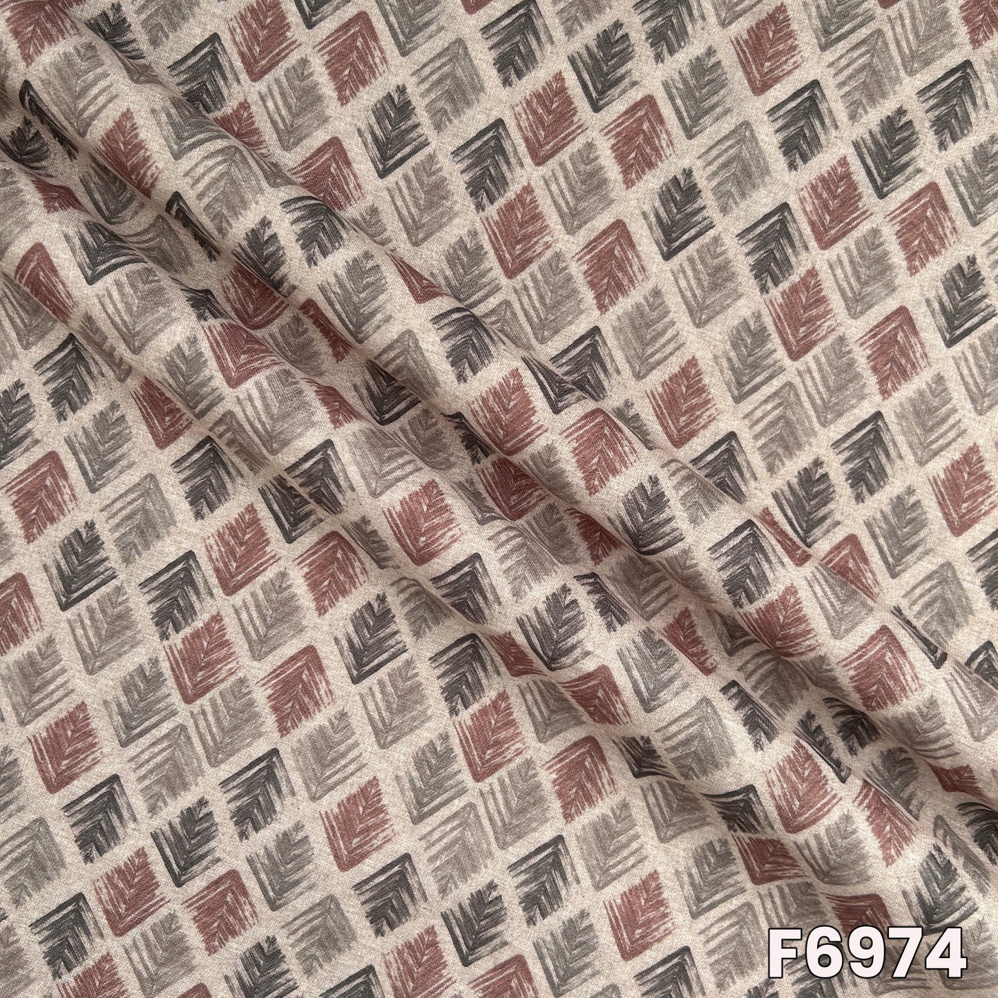 Draped F6974 semi linen fabric highlighting natural folds, smooth texture and modern all-over geometric design
