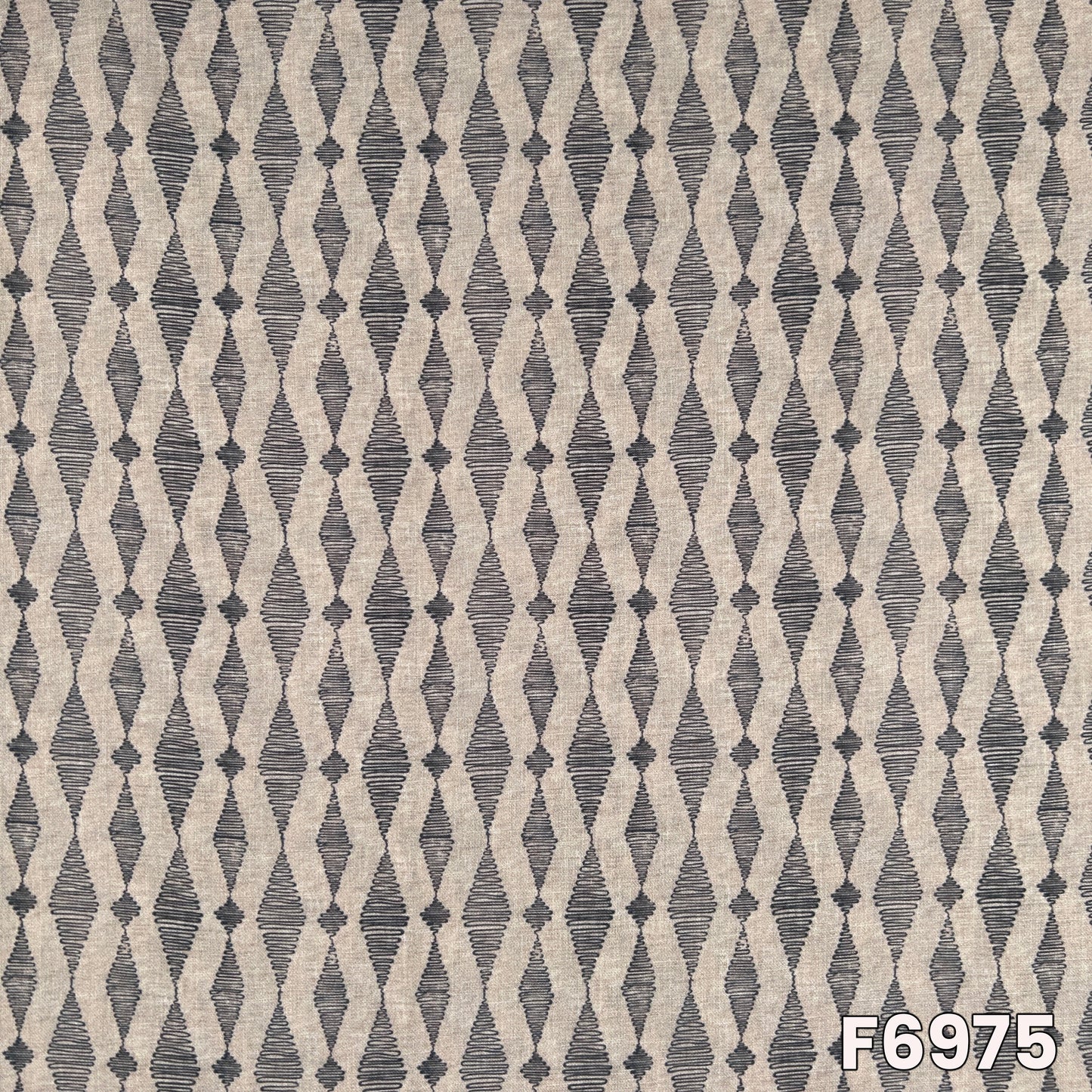Close pattern view of F6975 showing clean linear shapes, minimal design and smooth linen texture