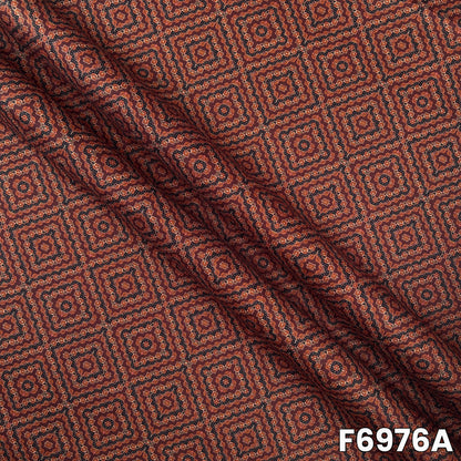 Close view of F6976A showing neat repeated patterns, earthy rust shade and soft linen texture