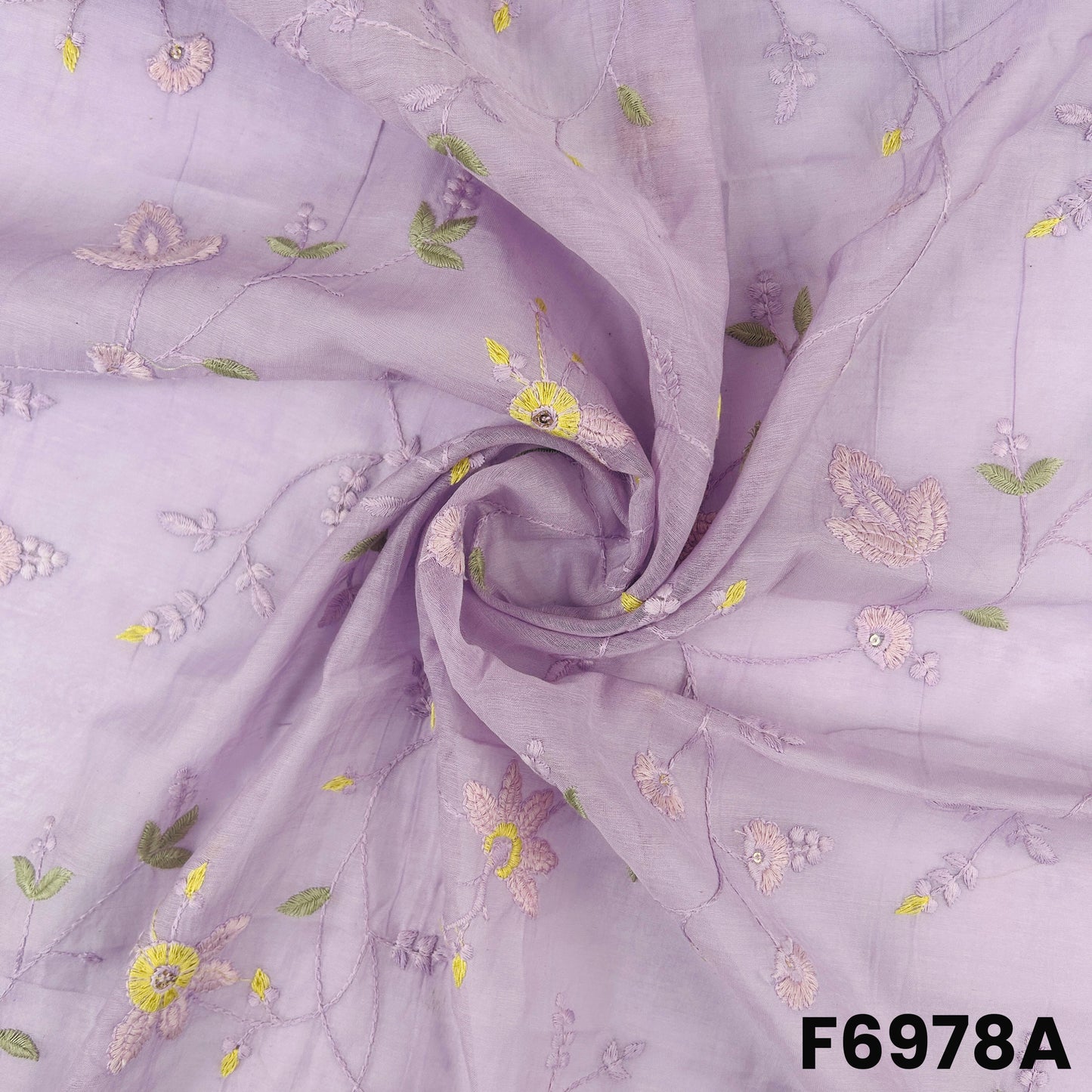 Close view of F6978A showing pastel purple folds, fine floral threadwork and gentle shimmer accents