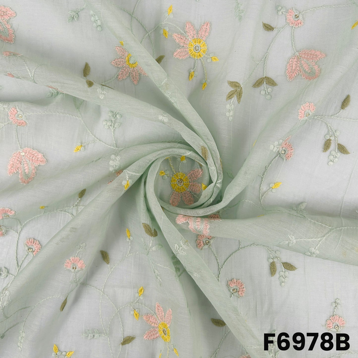 Draped F6978B fabric highlighting airy texture, small stitched flowers and elegant festive finish