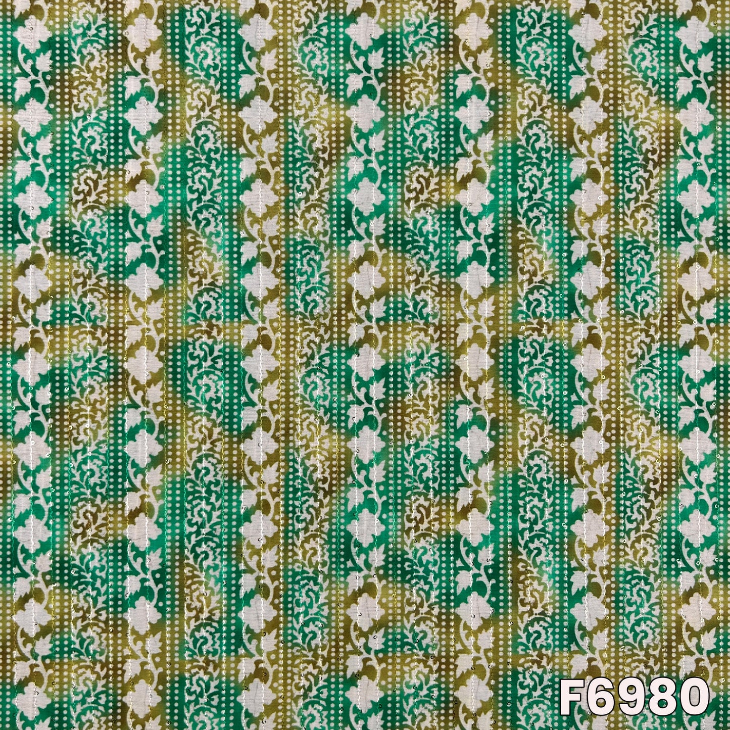 Close pattern view of F6980 showing vertical floral stripes, ornate borders and subtle sequins accents