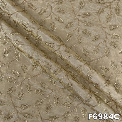 Detailed F6984C surface showing pale metallic sheen, floral embroidery and refined occasion-wear finish