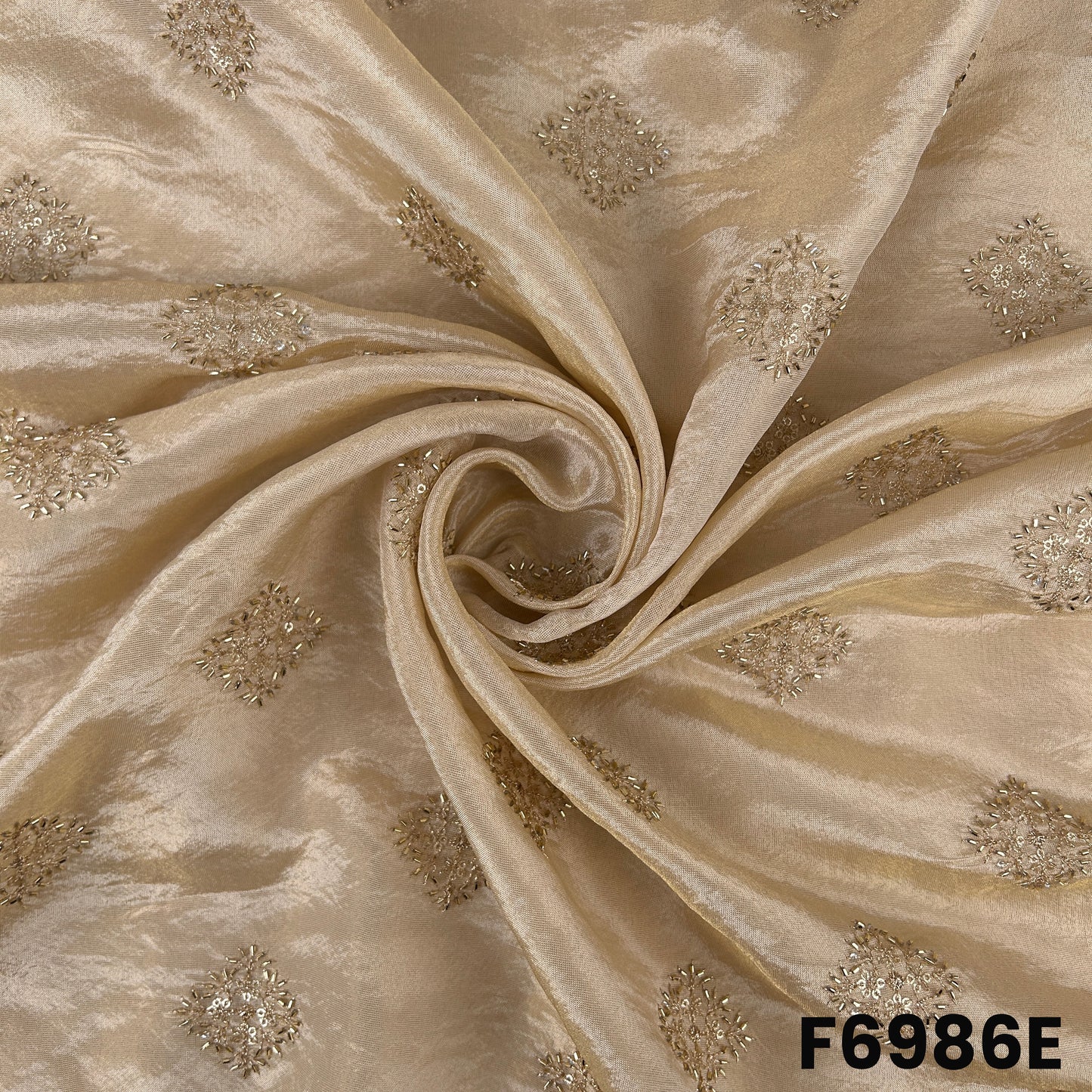 Detailed ivory F6986E surface highlighting cut dana work, zari embroidery and smooth festive sheen