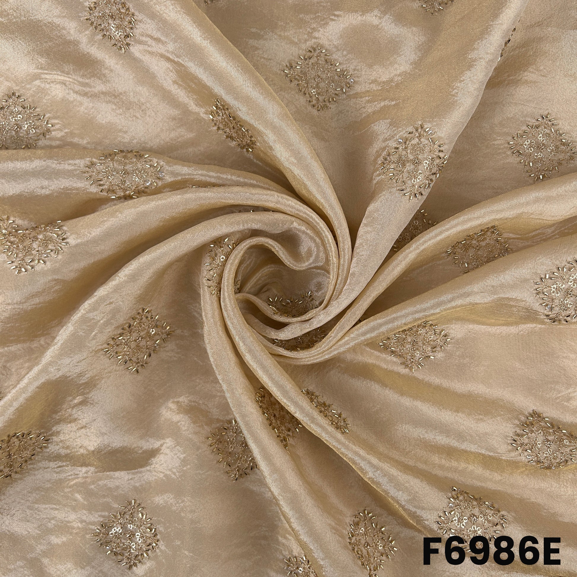 Detailed ivory F6986E surface highlighting cut dana work, zari embroidery and smooth festive sheen