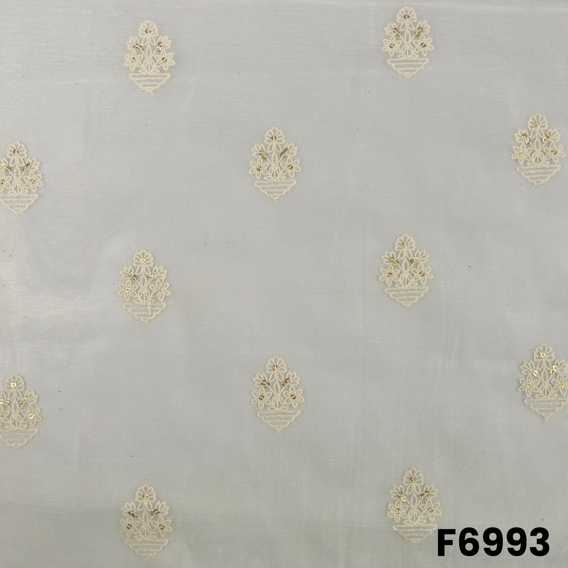 Close pattern view of F6993 showing delicate golden butti motifs on a lightweight ivory Chanderi Silk base
