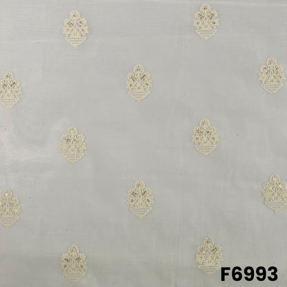 Close pattern view of F6993 showing delicate golden butti motifs on a lightweight ivory Chanderi Silk base
