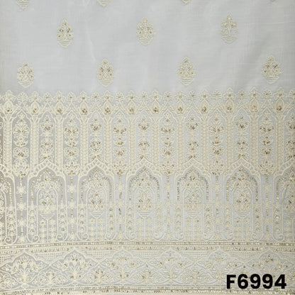 Close view of F6994 highlighting the heavy embroidered border, fine thread detailing and soft golden sequins finish