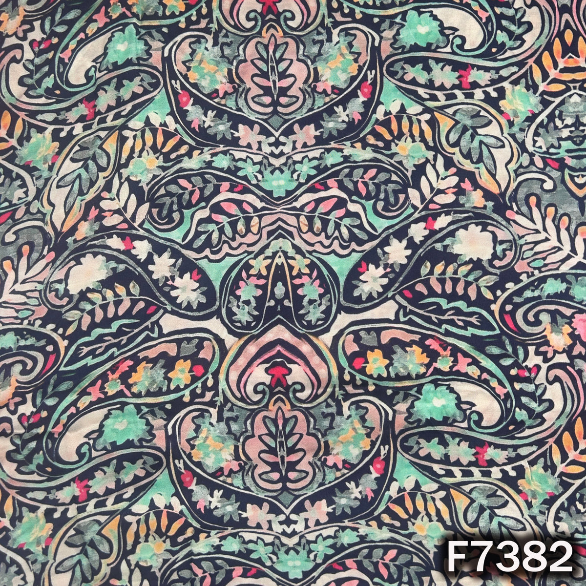Modal satin fabric with intricate multicolor paisley and floral motifs