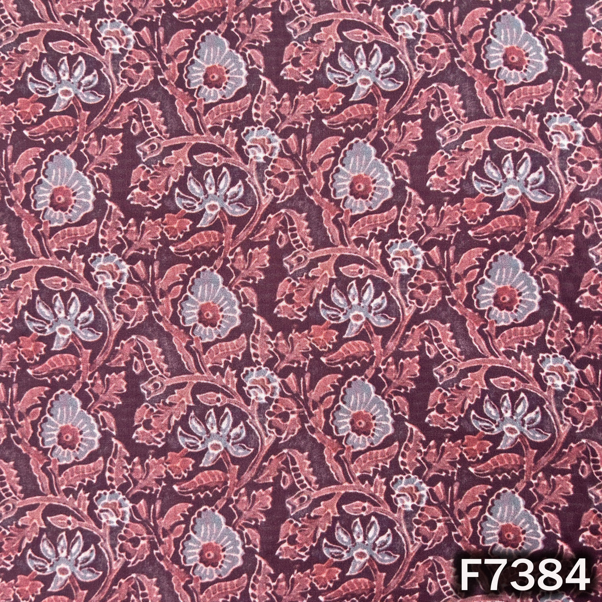 Printed modal satin fabric with pink floral vines