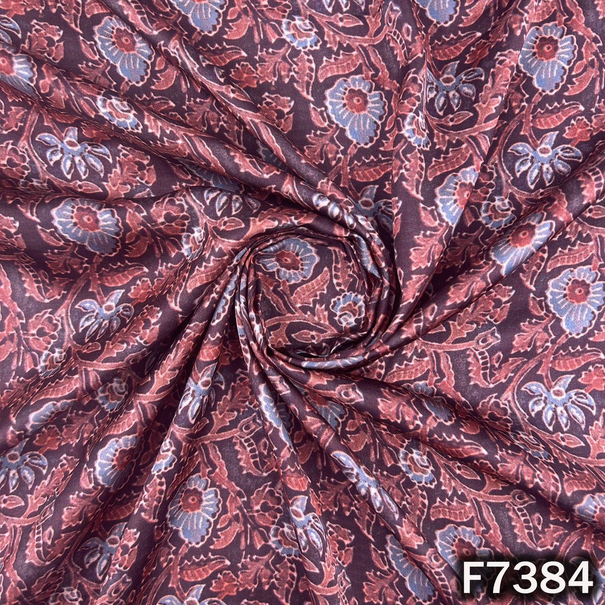 Designer modal satin fabric with muted floral pattern