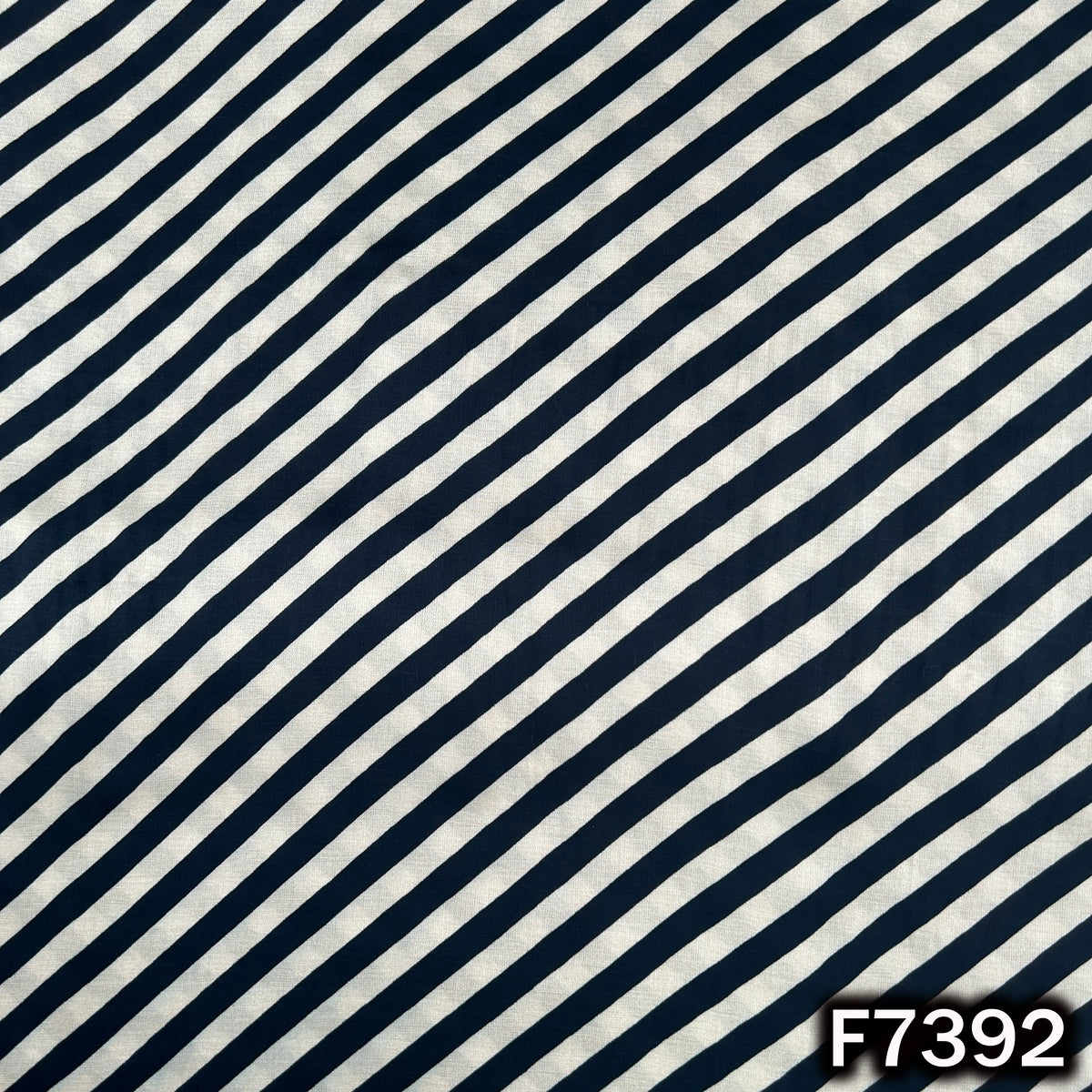 Modal satin fabric with diagonal black white stripes