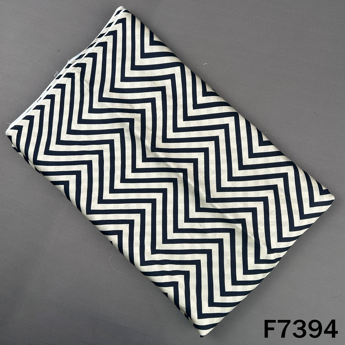 Black ivory modal satin fabric with zig zag print
