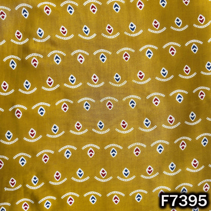 Yellow modal satin fabric with multicolor geometric motifs