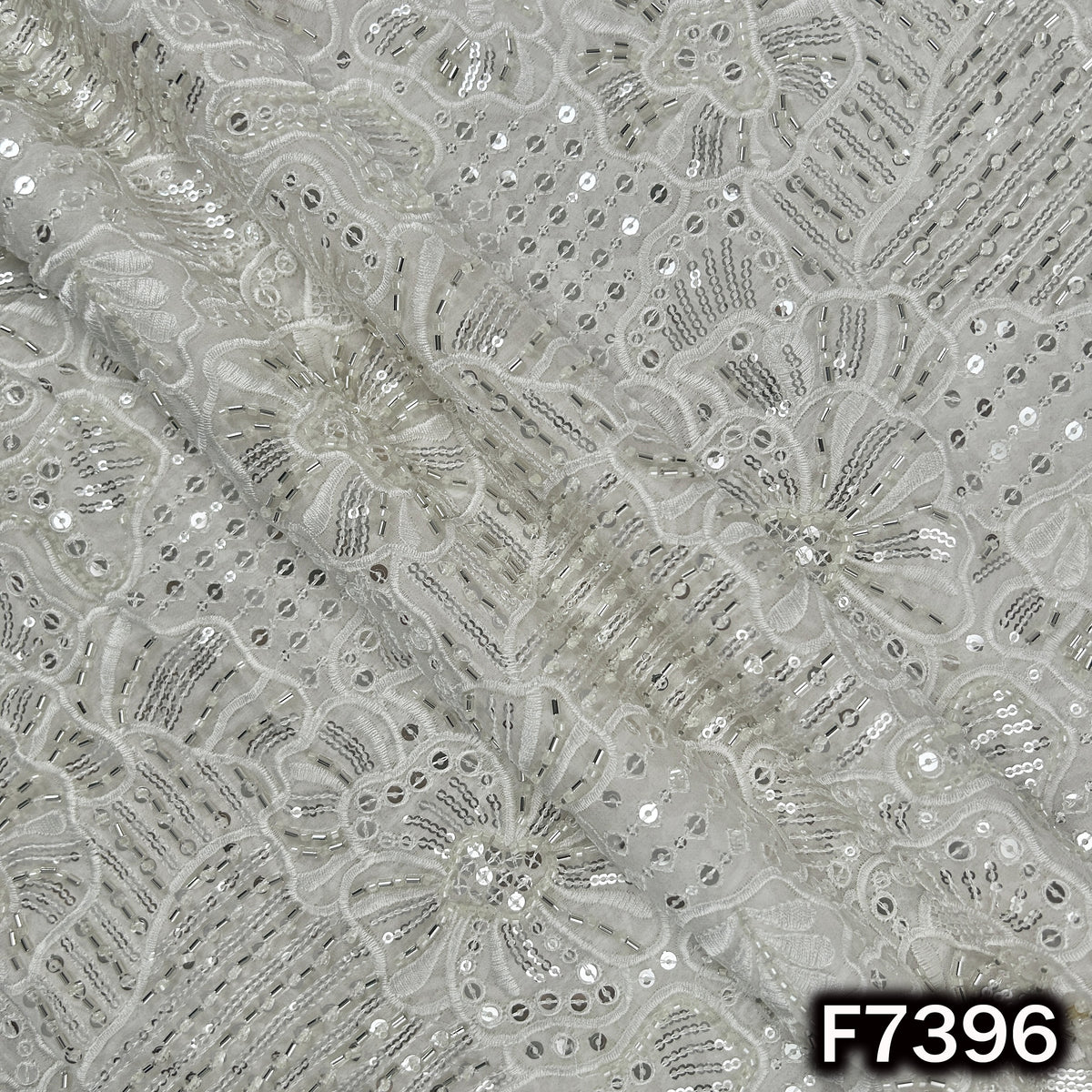 Designer georgette fabric with intricate cut dana motifs