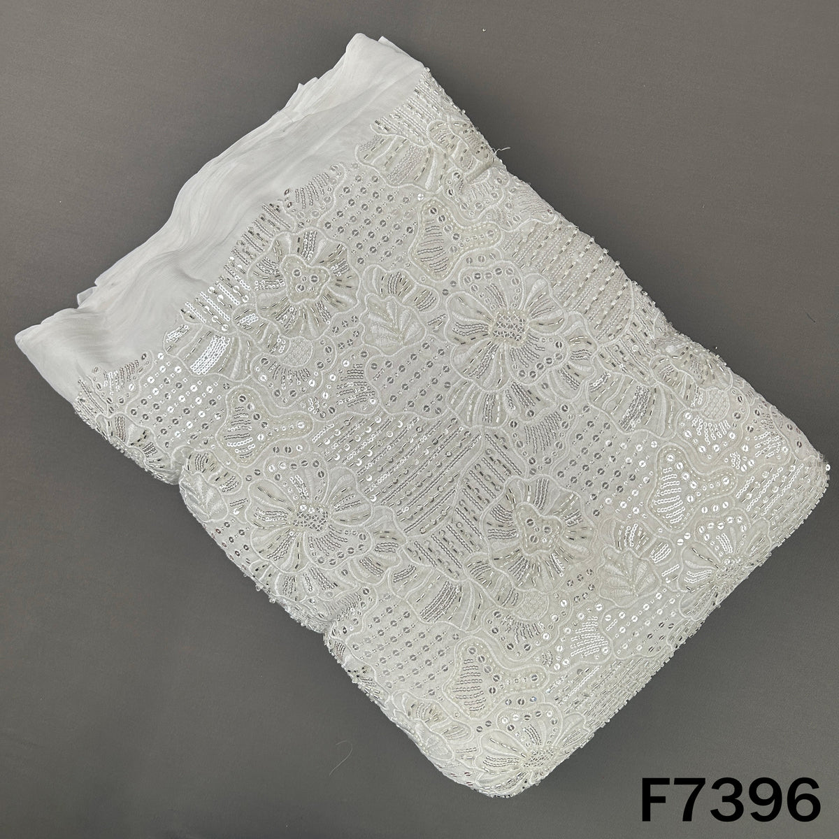 White georgette fabric with cut dana thread embroidery