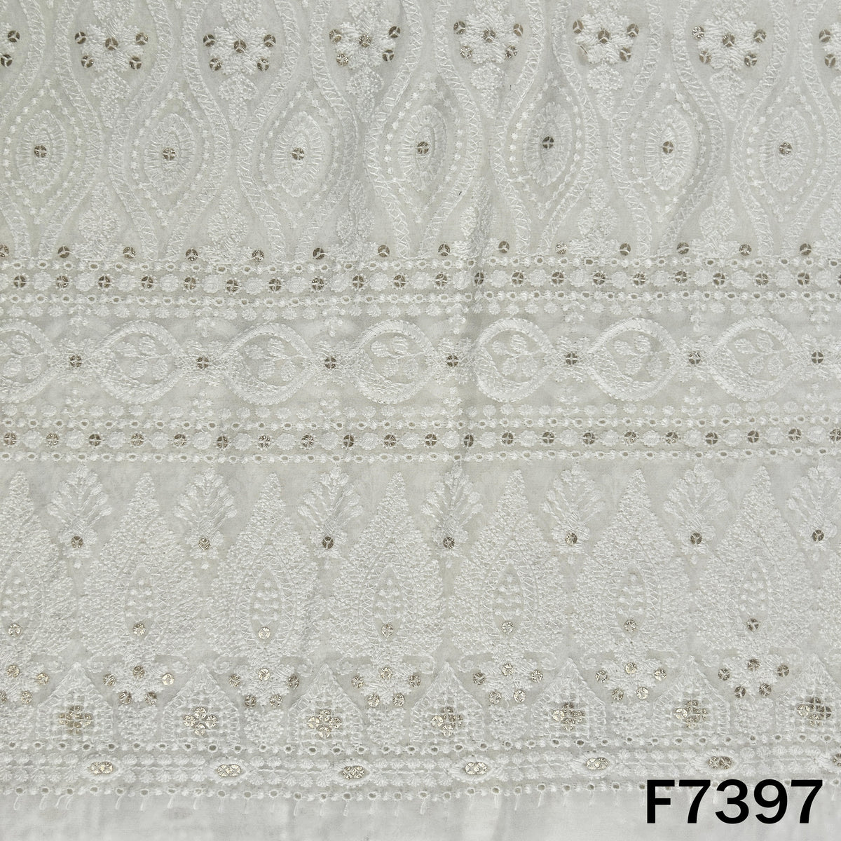 Dyeable georgette fabric with white embroidered sequin pattern