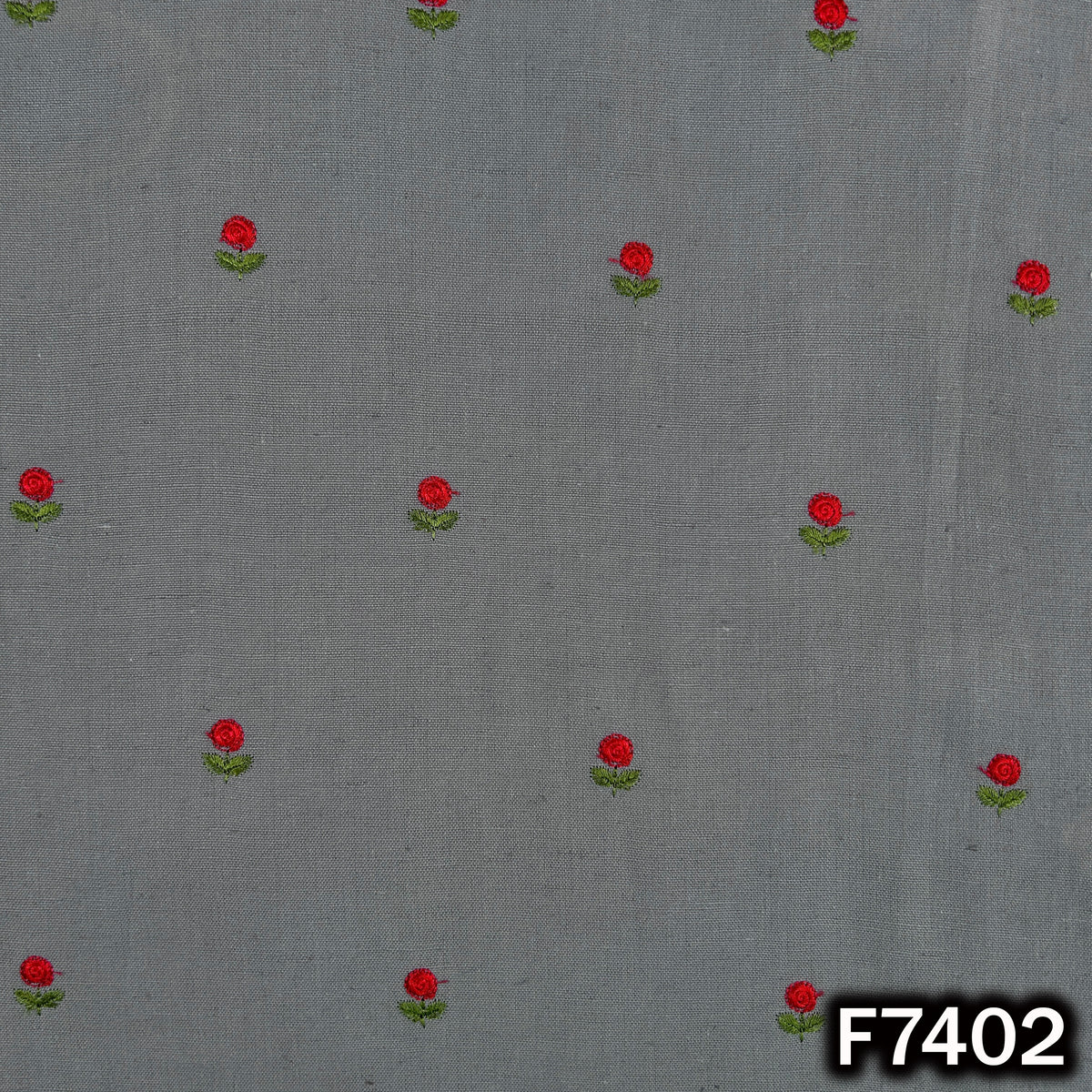 Grey cotton fabric with scattered red floral motifs