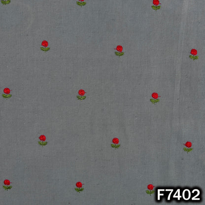 Grey cotton fabric with scattered red floral motifs
