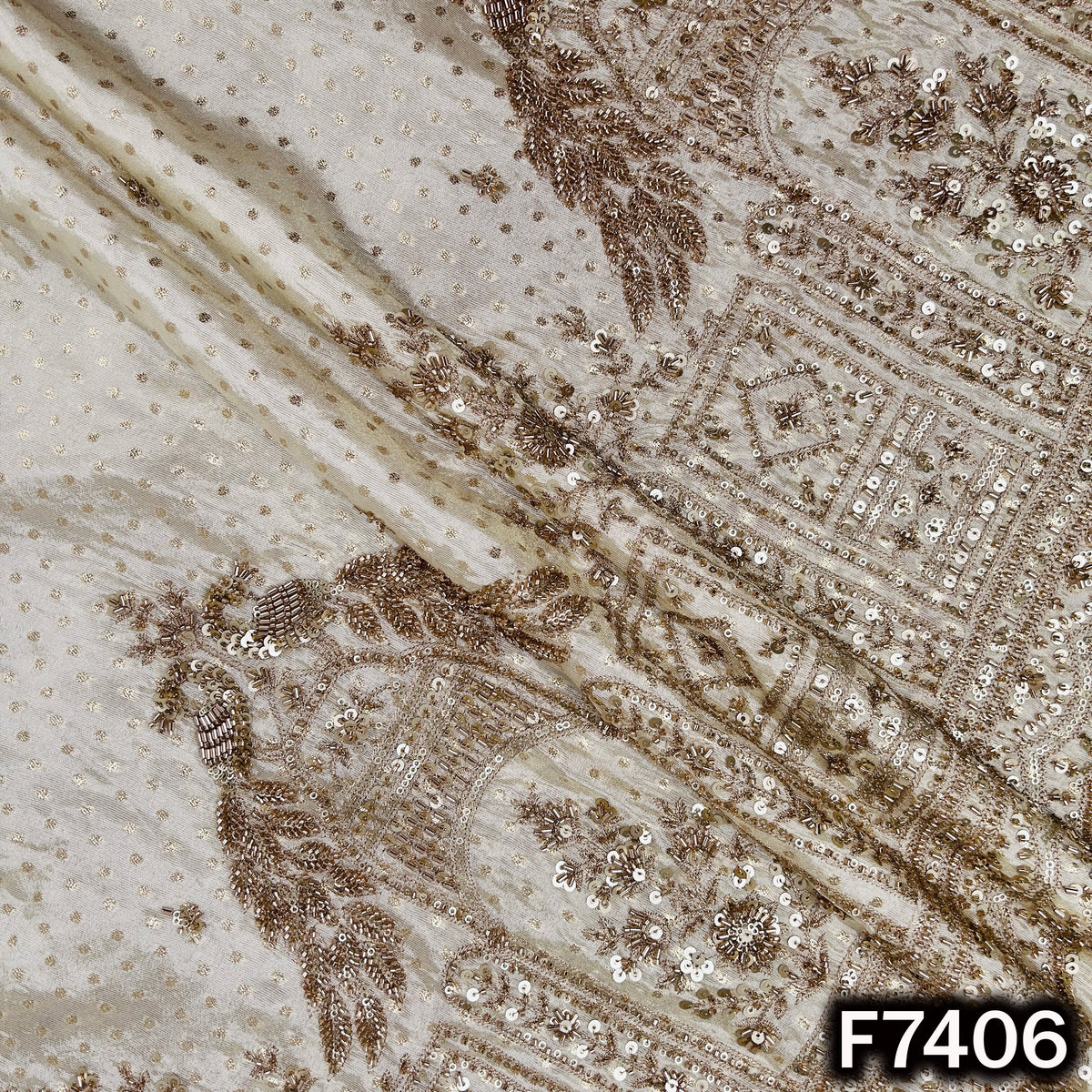 Ivory designer tissue fabric with zari sequin embroidery