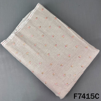 Beige linen fabric featuring multicolor embroidered floral motifs
