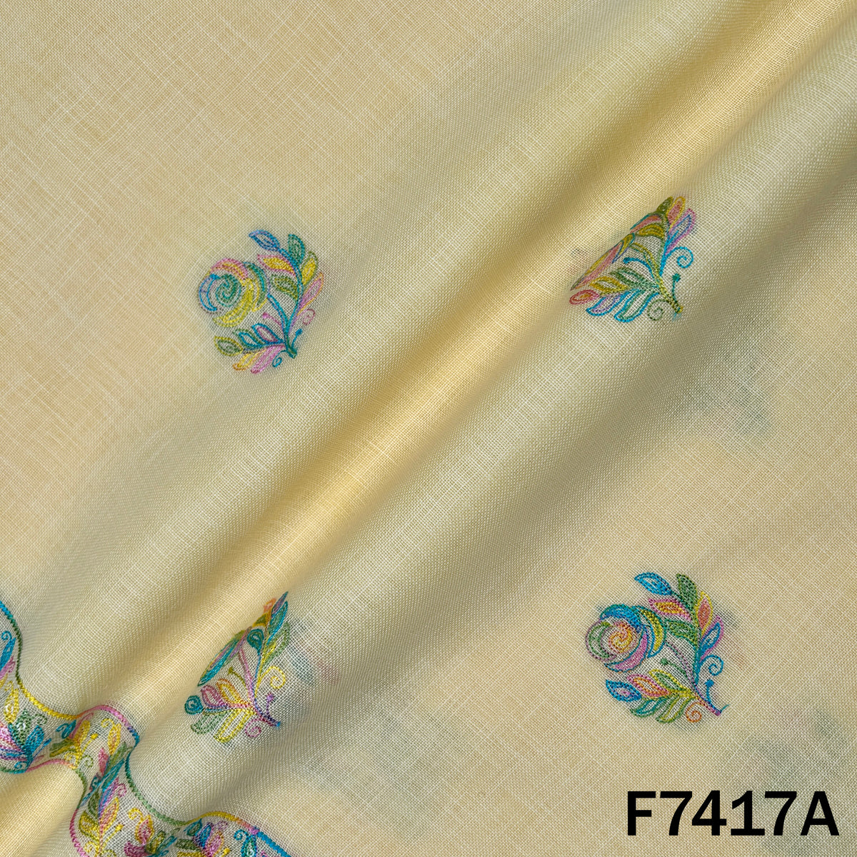 Yellow designer linen fabric with embroidered floral motifs