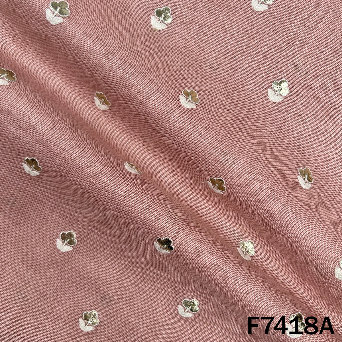 Designer linen fabric with scattered zari thread motifs