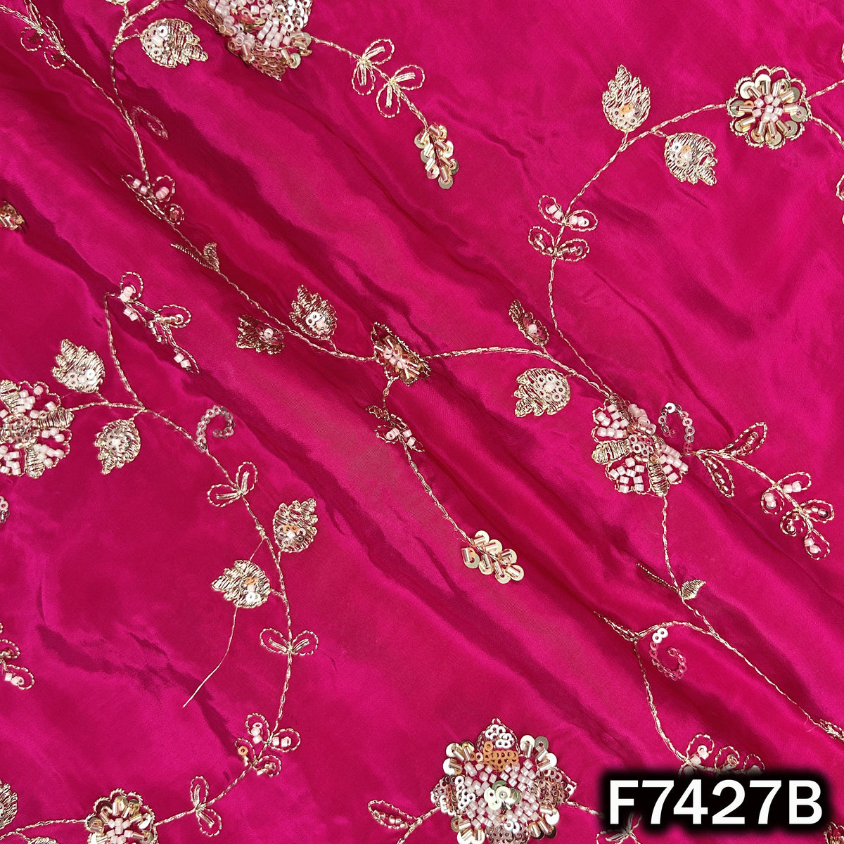 Pink embroidered crepe fabric with cut dana motifs