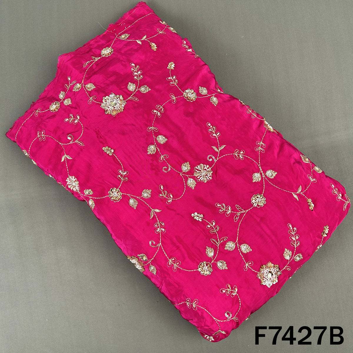 Rani pink crepe fabric with floral zari work