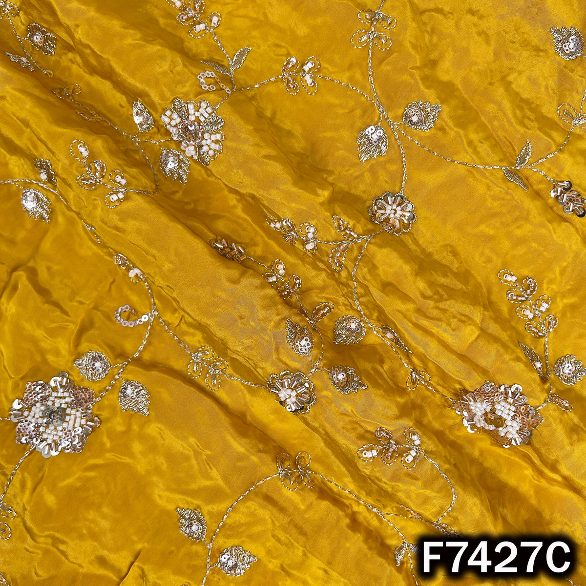 Yellow designer crepe fabric with metallic floral embroidery