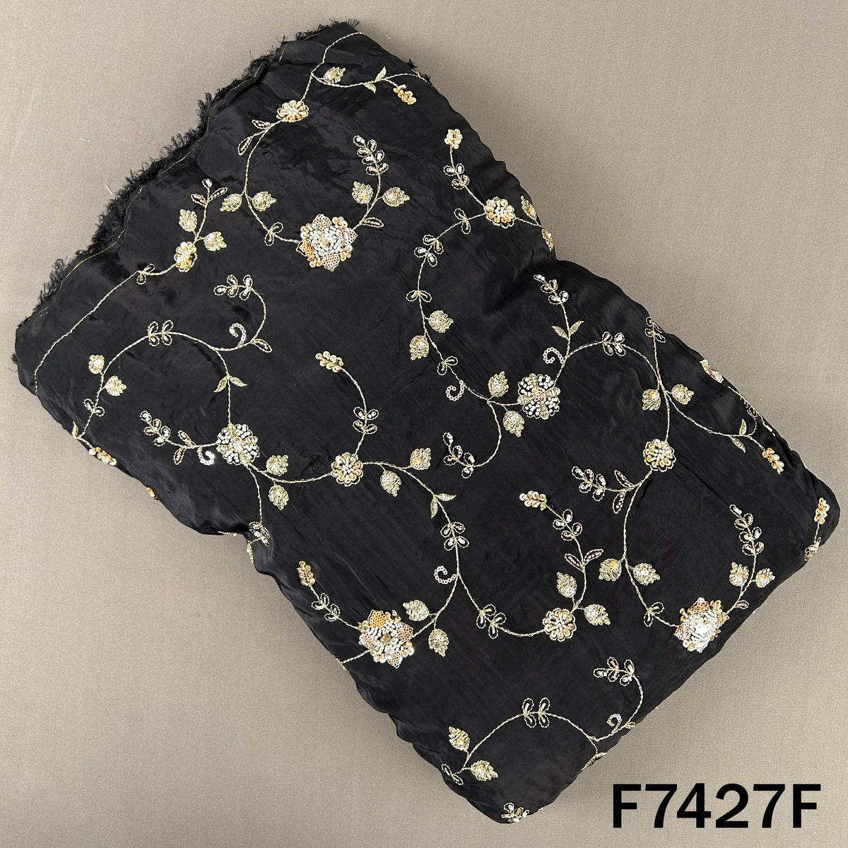Black crepe fabric with zari sequin floral motifs