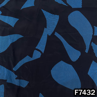 Black crepe fabric with bold blue geometric motifs