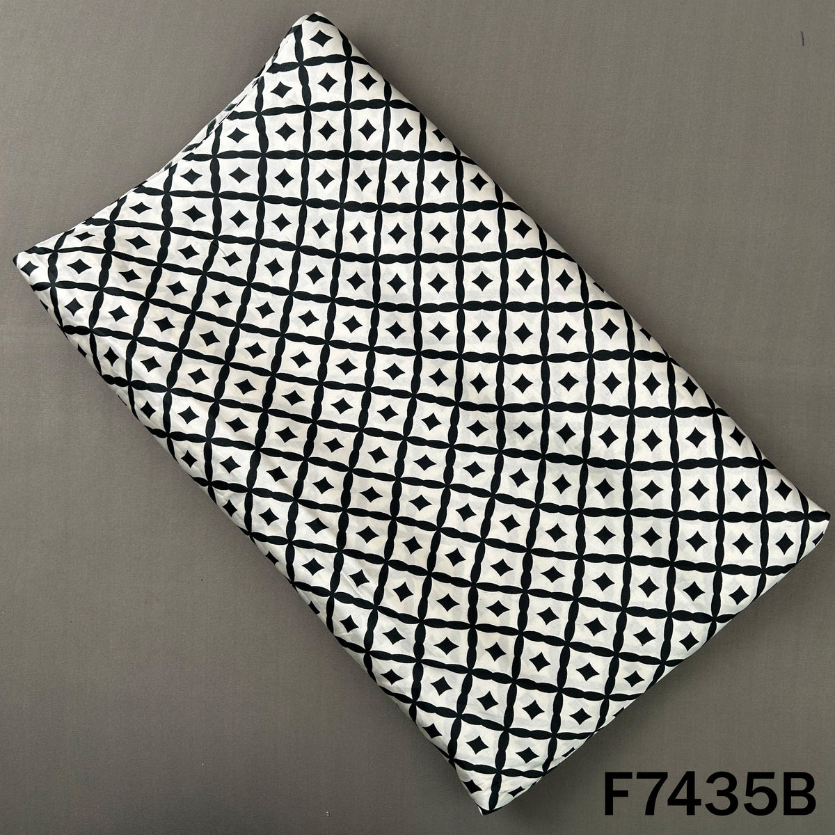 White crepe satin bottom with black geometric print