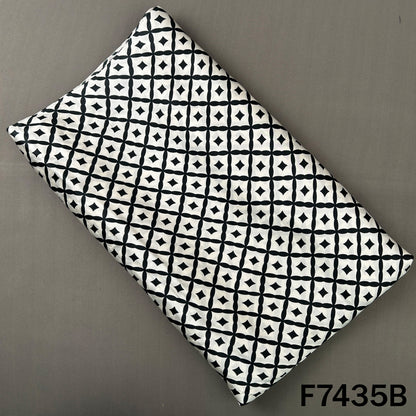 White crepe satin bottom with black geometric print