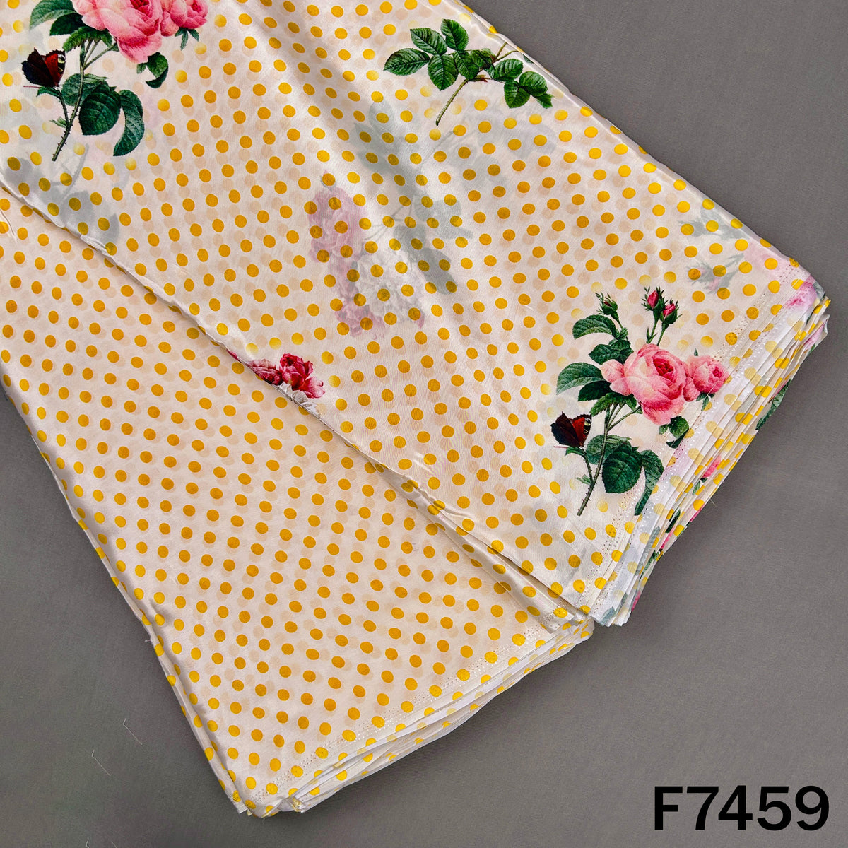 Yellow polka dot crepe fabric with rose print