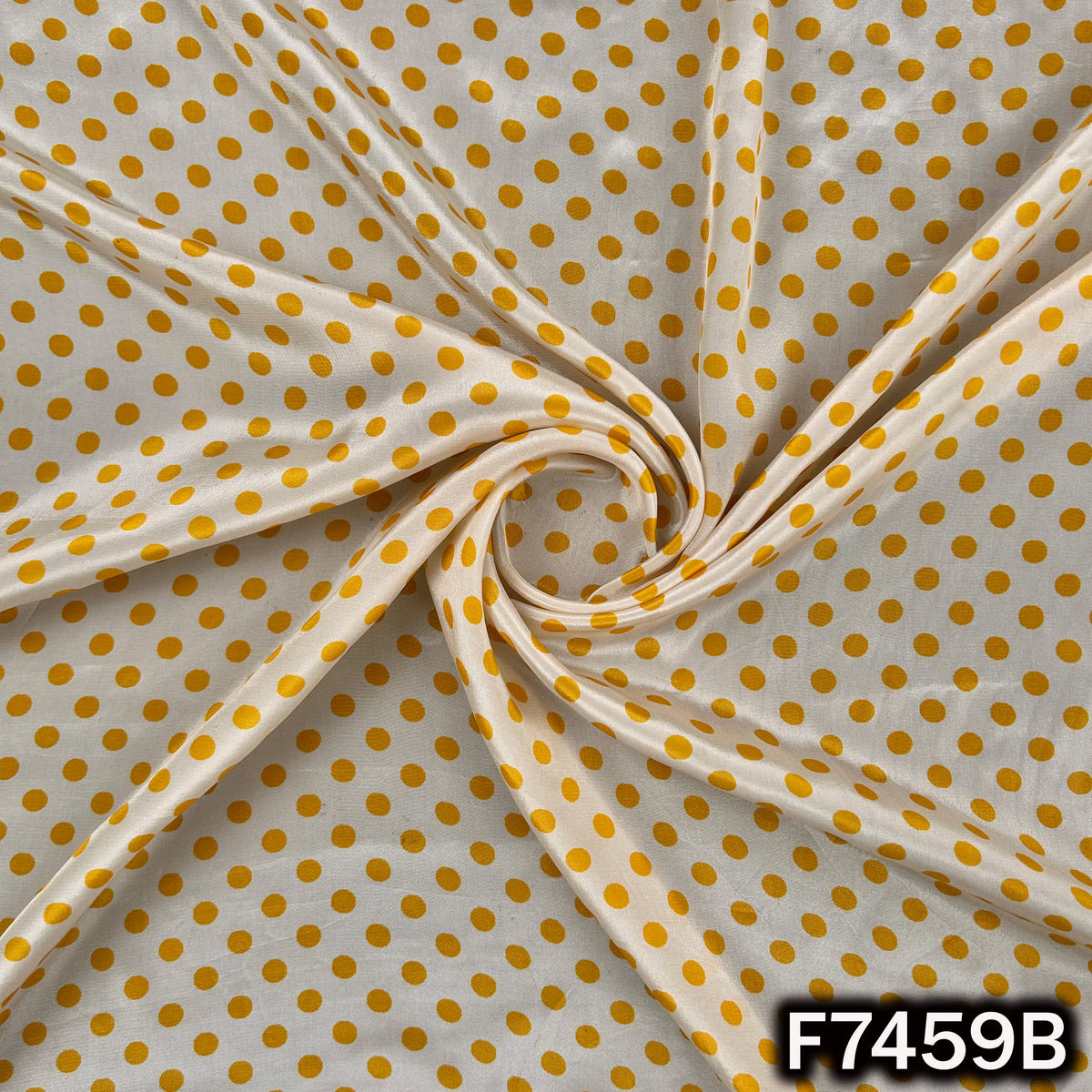 Yellow crepe suit material with polka dot pattern