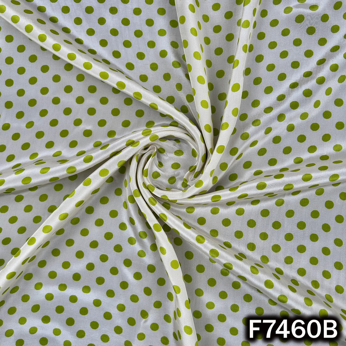Green polka dot crepe suit material drape
