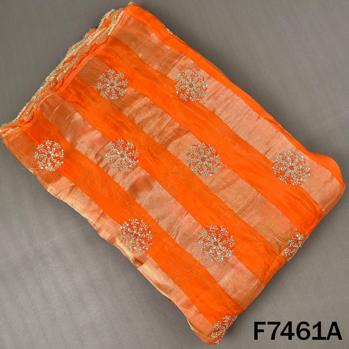 Orange striped tissue top with circular embroidered motifs
