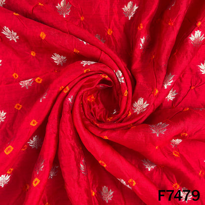 Red designer Bandhani fabric with metallic motifs