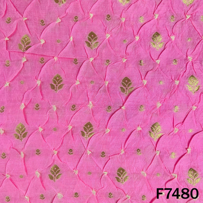 Pink silk fabric with gold floral Bandhani pattern