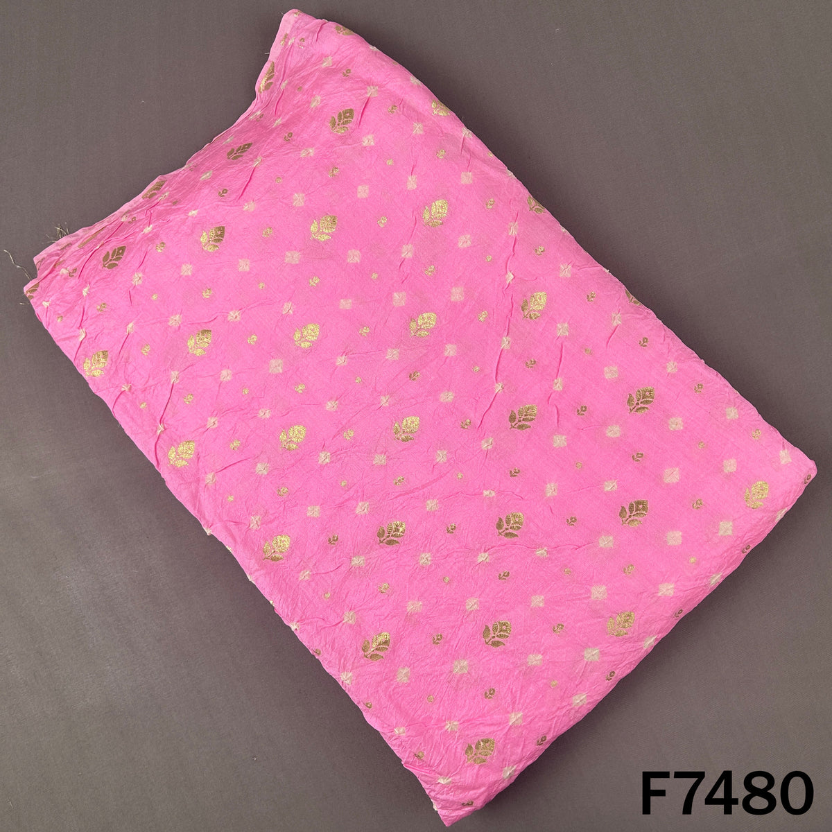 Pink Bandhani silk fabric with gold floral motifs