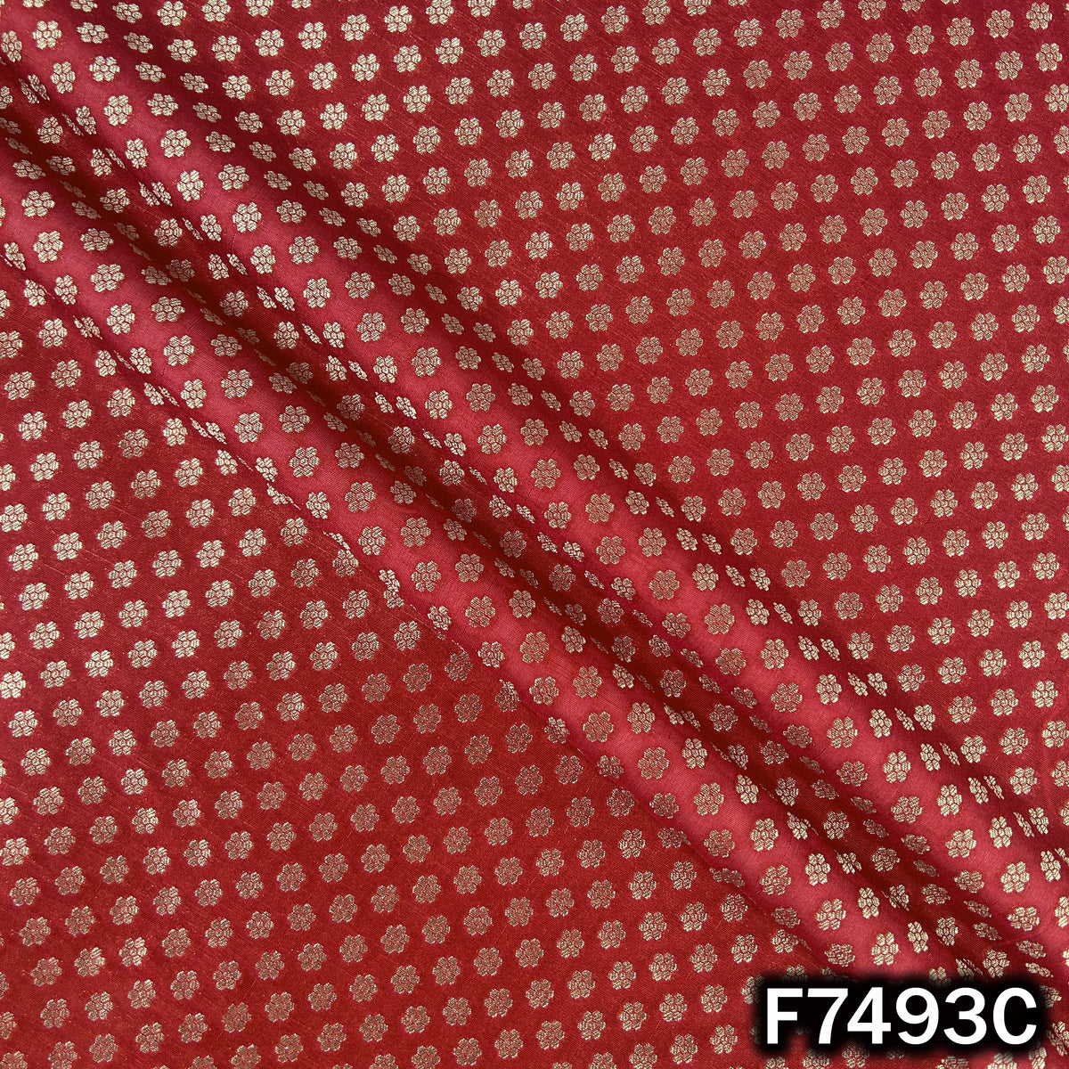 Rust designer brocade featuring compact zari buti weave