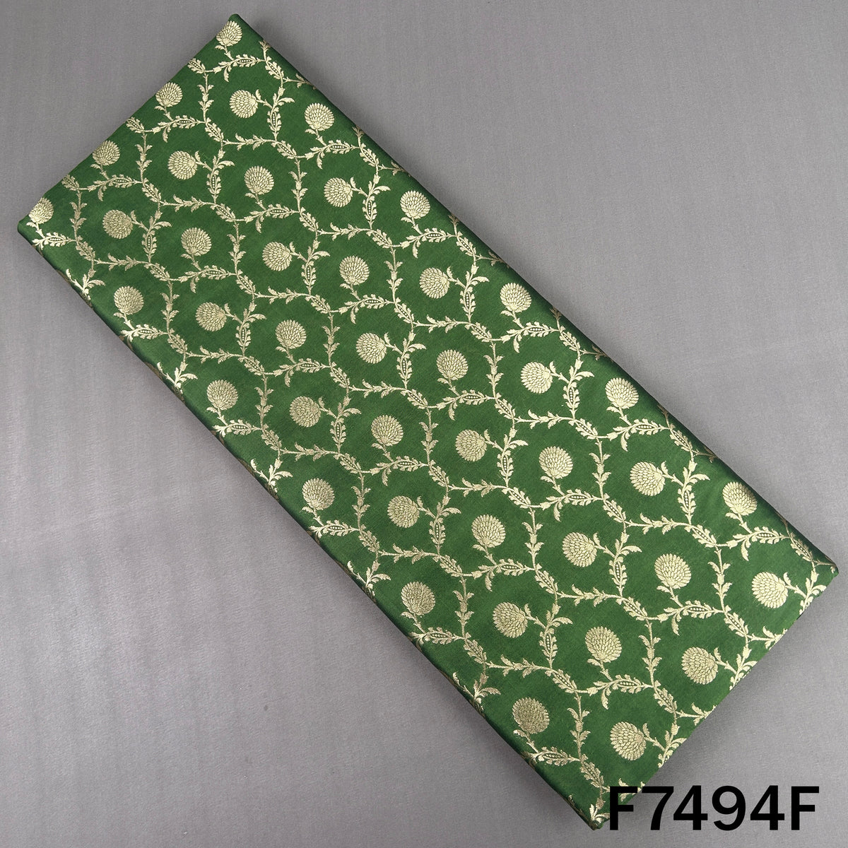 Green Banarasi brocade silk with golden vine motifs