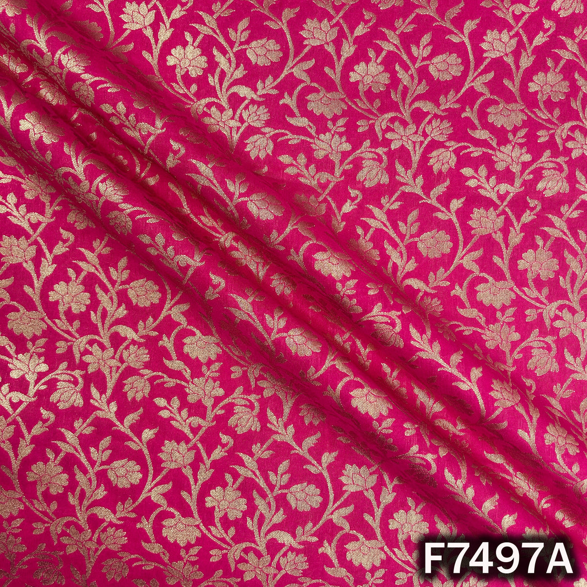 Pink designer brocade fabric with woven vine motifs
