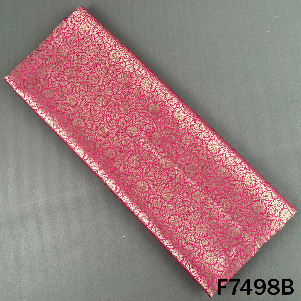 Magenta Banarasi brocade silk with woven floral motifs
