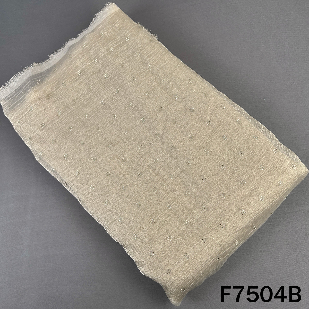 Beige crush tissue fabric with delicate dew drop work