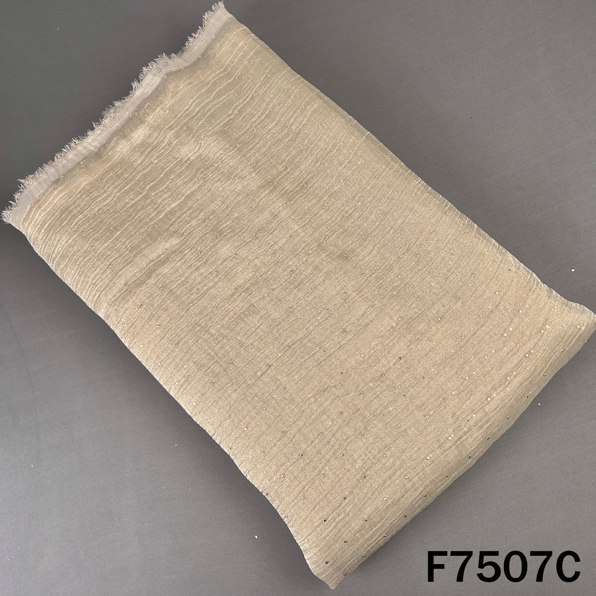 Beige crush tissue fabric with delicate dew drops